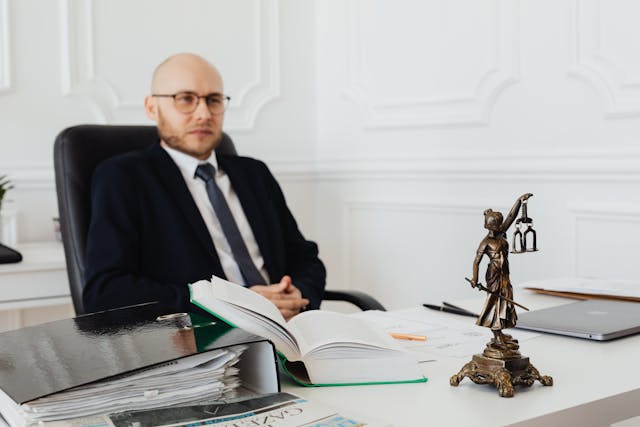 lawyer sitting at desk